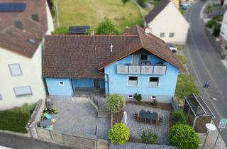 Einfamilienhaus kaufen in 97342 Seinsheim, Wohnen mit Weite – Einfamilienhaus auf außergewöhnlich großzügigem Grundstück