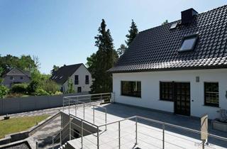 Doppelhaushälfte kaufen in 39175 Biederitz, Eine Doppelhaushälfte mit einem großen Garten und Gartenhaus.