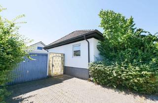 Haus kaufen in 33014 Bad Driburg, Geräumiges Fertighaus mit Wintergarten und großem Potenzial