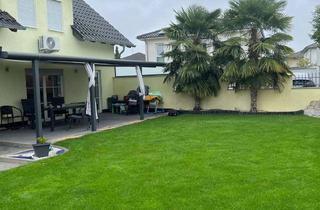 Einfamilienhaus kaufen in 64331 Weiterstadt, Exklusives Einfamilienhaus mit Wohlfühlgarten