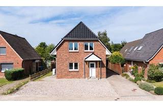 Einfamilienhaus kaufen in 25764 Wesselburen, Energieeffizientes Einfamilienhaus mit weitläufigem Grundstück in ruhiger Wohnlage in Wesselburen