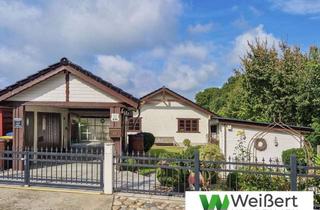 Haus kaufen in 24594 Meezen, Charmantes Blockbohlenhaus mit ca. 84 m² Wohnfläche undCarport auf gepflegtem 545 m² Grundstück