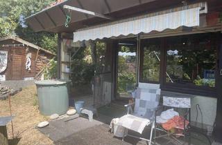 Wohnung kaufen in 97078 Versbach, Geräumige 3 Zimmer Wohnung mit eigenem Garten und Garage