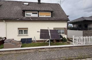 Doppelhaushälfte kaufen in 35708 Haiger, Renovierungsbedürftige Doppelhaushälfte mit viel Potenzial. Auch als Zweifamilienhaus nutzbar.