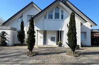Einfamilienhaus kaufen in 33378 Rheda-Wiedenbrück, Klare Linien. Edle Materialien. Zeitlose Architektur.Einfamilienhaus in Rheda-Wiedenbrück.