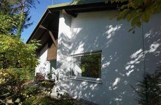 Haus kaufen in 82538 Geretsried, 60er-Jahre-Bungalow mit Charakter direkt an den Isarauen
