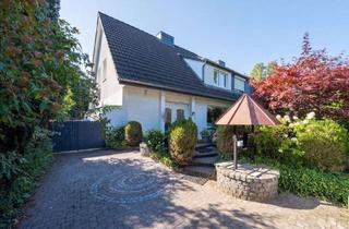 Doppelhaushälfte kaufen in 22949 Ammersbek, Familienglück in Ammersbek: großzügige Doppelhaushälfte mit Garten und Außenküche