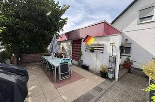 Einfamilienhaus kaufen in 64295 Darmstadt, Geräumiges Einfamilienhaus mit separat nutzbarem Einlieger- und Souterrainbereich