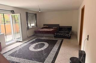 Wohnung kaufen in 76297 Stutensee, Helle, modernisierte 3,5-Zimmer-Souterrainwohnung mit Terrasse & Duplexparker in Stutensee