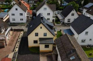 Haus kaufen in 35641 Schöffengrund, Naturnah wohnen, wenig Gartenarbeit: Gepflegtes Zuhause in Schöffengrund-Laufdorf