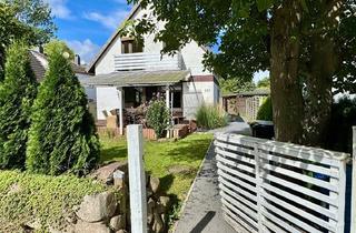 Einfamilienhaus kaufen in 24539 Neumünster, Freistehendes Einfamilienhaus mit zwei Garagen und schönem Garten in Neumünster-Gadeland