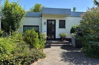 Einfamilienhaus kaufen in 63329 Egelsbach, Charmantes Einfamilienhaus mit besonderem Wohnkonzept in Egelsbach-Bayerseich