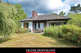 Haus kaufen in 24643 Struvenhütten, Bungalow mit Keller auf großem Grundstück in Struvenhütten