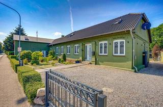 Haus kaufen in 24855 Jübek, Ein Haus, viele Perspektiven: Zweifamilienhaus für Familie, Vermietung & mögliche Gewerbenutzung!