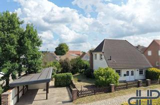 Einfamilienhaus kaufen in 39291 Hohenwarthe, Familienfreundliches Einfamilienhaus mit Kaminofen, Carport und gepflegtem Garten in ruhiger Lage