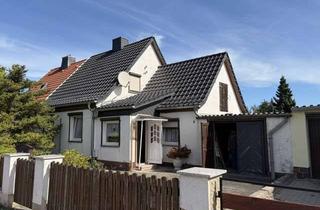 Doppelhaushälfte kaufen in Puppensiedlung, 06217 Beuna, Gemütliche Doppelhaushälfte mit großem Grundstück, Garage & Potenzial