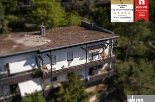Wohnung kaufen in Steinbachtal 75, 97082 Steinbachtal, Wohnen mit Charakter: 90 m² mit Kachelofen, Ankleide und großem Balkon