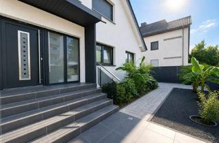 Mehrfamilienhaus kaufen in 63110 Rodgau, Viel Platz für den Alltag in diesem sanierten Mehrfamilienhaus in Rodgau