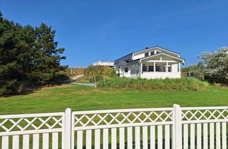 Haus kaufen in Willrath-Dreesen-Straße 84, 26465 Langeoog, Chalet in idyllischer Lage auf Langeoog mit Blick über Dünen und aufs Wattenmeer