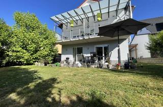 Haus kaufen in 55232 Alzey, Gepflegtes Zweifamilienhaus mit 2 separaten Wohneinheiten mit Garten, Balkon, Garage und Carport