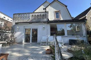 Haus kaufen in 65474 Bischofsheim, Ein Zuhause mit vielen Möglichkeiten-Charmantes 1-2 Familienhaus & Baugrundstück in Bischofsheim