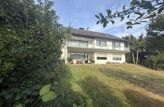 Einfamilienhaus kaufen in 65719 Hofheim am Taunus, Wohnen mit Weitblick – Einfamilienhaus mit vermieteter Einliegerwohnung in Hofheim-Wildsachsen
