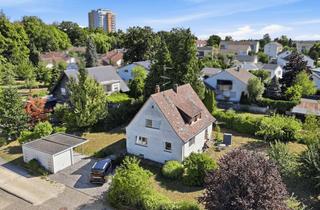 Haus kaufen in 88471 Laupheim, Potenzial! Zweifamilienhaus mit Garten sowie Baugrundstück und vielseitigen Nutzungsmöglichkeiten