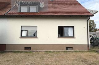 Doppelhaushälfte kaufen in 66424 Homburg, Gepflegte Doppelhaushälfte mit 2 vermieteten Wohnungen und schönem Grundstück in ruhiger Lage