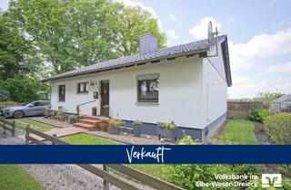 Haus kaufen in 27612 Loxstedt, Volksbank Immobilien: Bungalow - Gemütlichkeit trifft auf Gartenidylle!