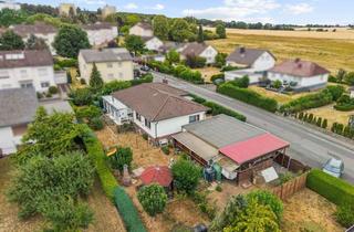 Einfamilienhaus kaufen in 35510 Butzbach, Großzügiges Grundstück trifft solide Immobilie in Butzbach