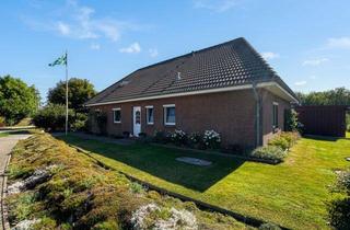 Einfamilienhaus kaufen in 25718 Friedrichskoog, Gepflegtes Einfamilienhaus mit großzügigem Wohnangebot und liebevoll angelegtem Grundstück in Friedrichskoog
