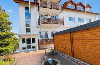 Wohnung kaufen in 74731 Walldürn, Gepflegte 3-Zimmer-Dachgeschosswohnung mit Balkon, Stellplatz und schönem Ausblick