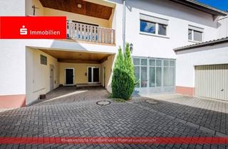 Wohnung kaufen in 63477 Maintal, Maintal-Wachenbuchen: Gartenwohnung auf ca. 251 Quadratmeter auf einer Ebene sowie einer Doppelgarag