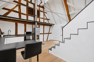 Wohnung kaufen in 64839 Münster, Außergewöhnliche Maisonettewohnung im historischen Hofensemble