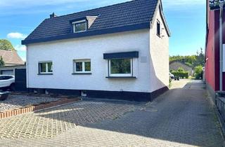 Einfamilienhaus kaufen in 53797 Lohmar, Viel Raum für Ihre Wohnideen: Charaktervolles Einfamilienhaus mit Doppelgarage in Lohmar