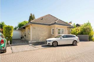 Haus kaufen in 68723 Schwetzingen, Bungalow mit ELW in beliebter Lage von Schwetzingen-Schälzig