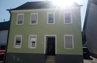 Einfamilienhaus kaufen in Hauptstraße 50, 55758 Mörschied, Viel Platz in Mörschied: Einfamilienhaus mit sieben Zimmern