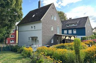 Haus kaufen in 42579 Heiligenhaus, Gepflegtes Ein- bis Dreifamilienhaus in ruhiger Lage von Heiligenhaus