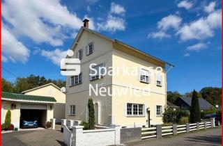 Haus kaufen in 56305 Döttesfeld, Teilmodernisiertes Zweifamilienhaus mit Doppelgarage und Garten
