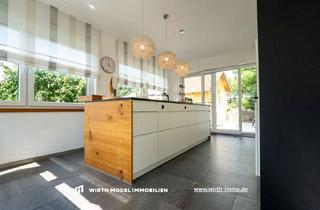 Haus kaufen in 97490 Poppenhausen, Ansprechende Immobilie mit zwei Garagen und schönem Garten sowie vielfältigen Nutzungsmöglichkeiten