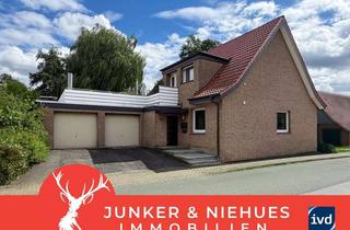 Haus kaufen in 33803 Steinhagen, Flexibles Wohnen in Steinhagen – Zweifamilienhaus mit großer Sonnenterrasse