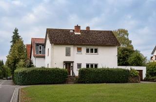 Haus kaufen in 61273 Wehrheim, Zweifamilienhaus auf ca. 614 m² Grundstück mit Ausbaupotenzial
