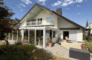 Einfamilienhaus kaufen in 54497 Morbach, Großzügiges Einfamilienhaus mit Galerie, Wintergarten & neuer Wärmepumpe -Viel Platz & Ausbaureserve