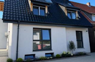 Wohnung mieten in Breslauer Straße 16a, 33378 Rheda-Wiedenbrück, Moderne Wohnung im 1. Geschoss mit Balkon & Gemeinschaftsgarten Etagenwohnung