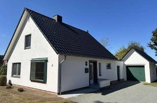 Einfamilienhaus kaufen in 25727 Süderhastedt, Charmantes Einfamilienhaus mit Garage und Werkstattgebäude