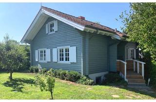 Haus kaufen in 23738 Lensahn, Ein Traum aus Holz mit Gartenparadies