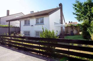 Einfamilienhaus kaufen in 63128 Dietzenbach, Modernisiertes, freistehendes Einfamilienhaus mit wohnlich ausgebautem Souterrain