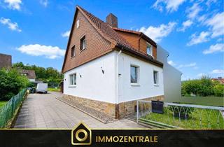 Einfamilienhaus kaufen in 34346 Hann. Münden, Charmantes Einfamilienhaus mit großzügigem Garten und eigener Zufahrt
