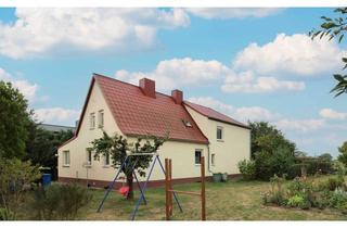 Haus kaufen in 04509 Delitzsch, Sofort bezugsfertig: Gepflegtes Zuhause mit großzügigem Garten und 3 Garagen in Delitzsch-Laue