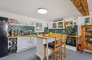 Einfamilienhaus kaufen in 35396 Gießen, Modernisiertes Einfamilienhaus mit Charme und 1.265 m² Grundstück in Gießen-Wieseck